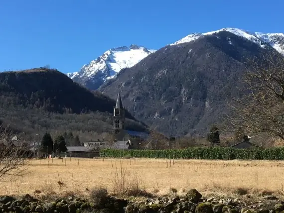 church and snow capped pyrenees